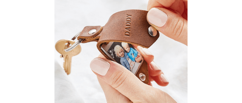 leather keychain personalized with "daddy" and photo of kids