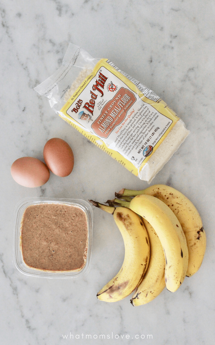 ingredients for banana pancakes - eggs, almond butter, almond flour and bananas