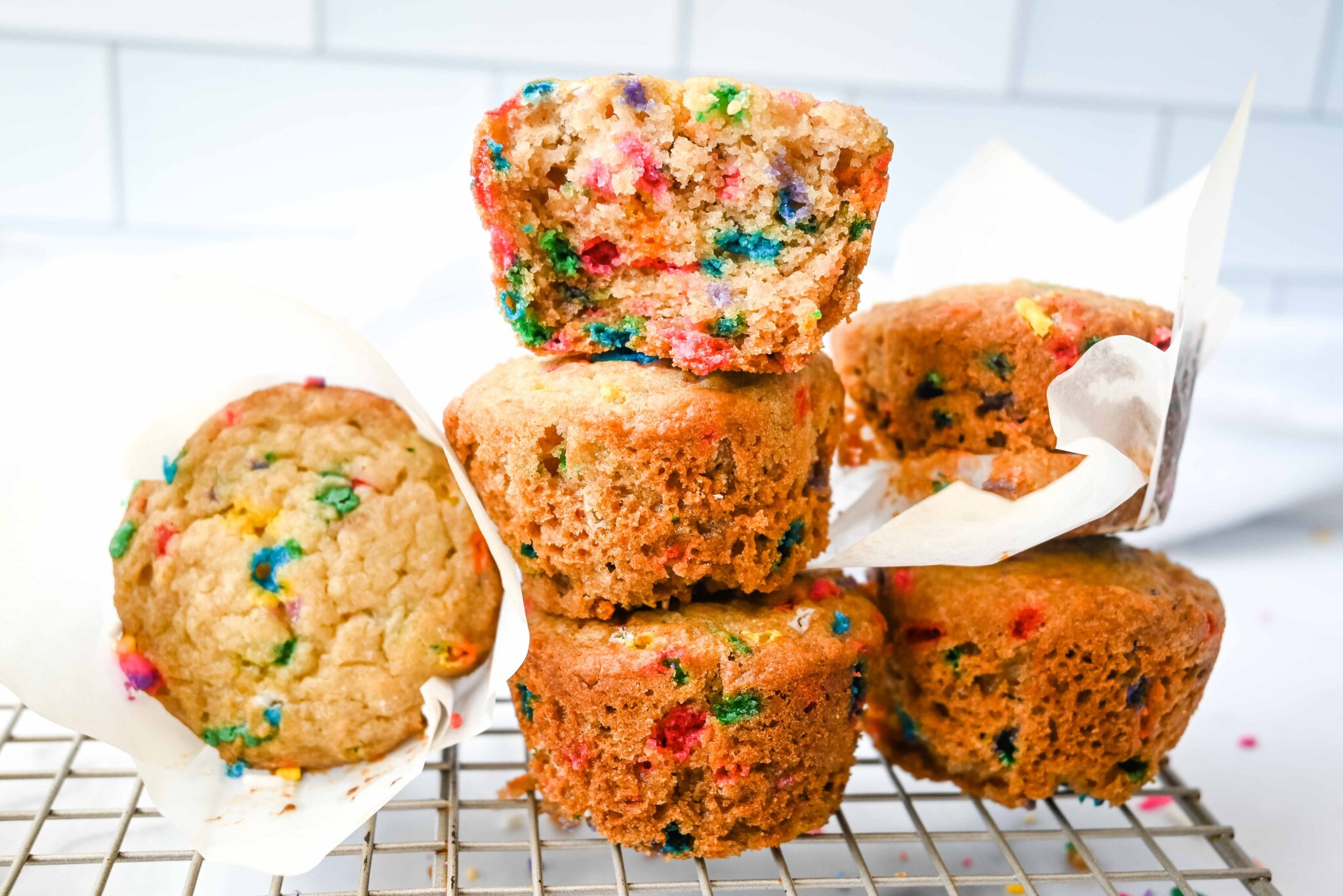 Birthday Cake Muffins showing rainbow sprinkles inside